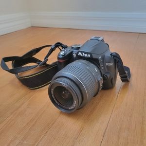 Nikon DSLR D3000 w/ 18-55mm lens